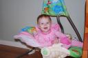 Fun in her swing at 11 months!